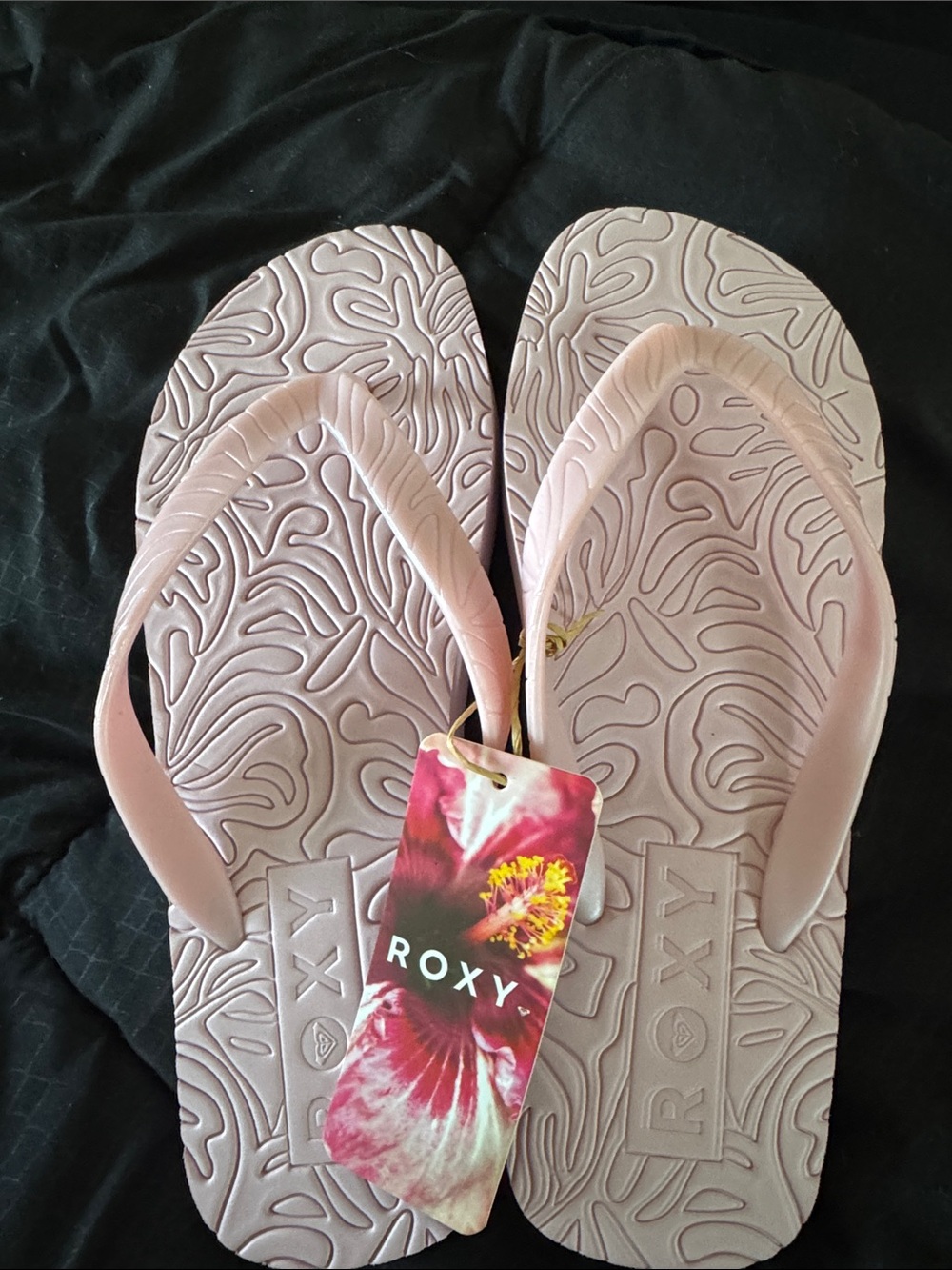 Roxy Light Pink Embossed Flip Flops